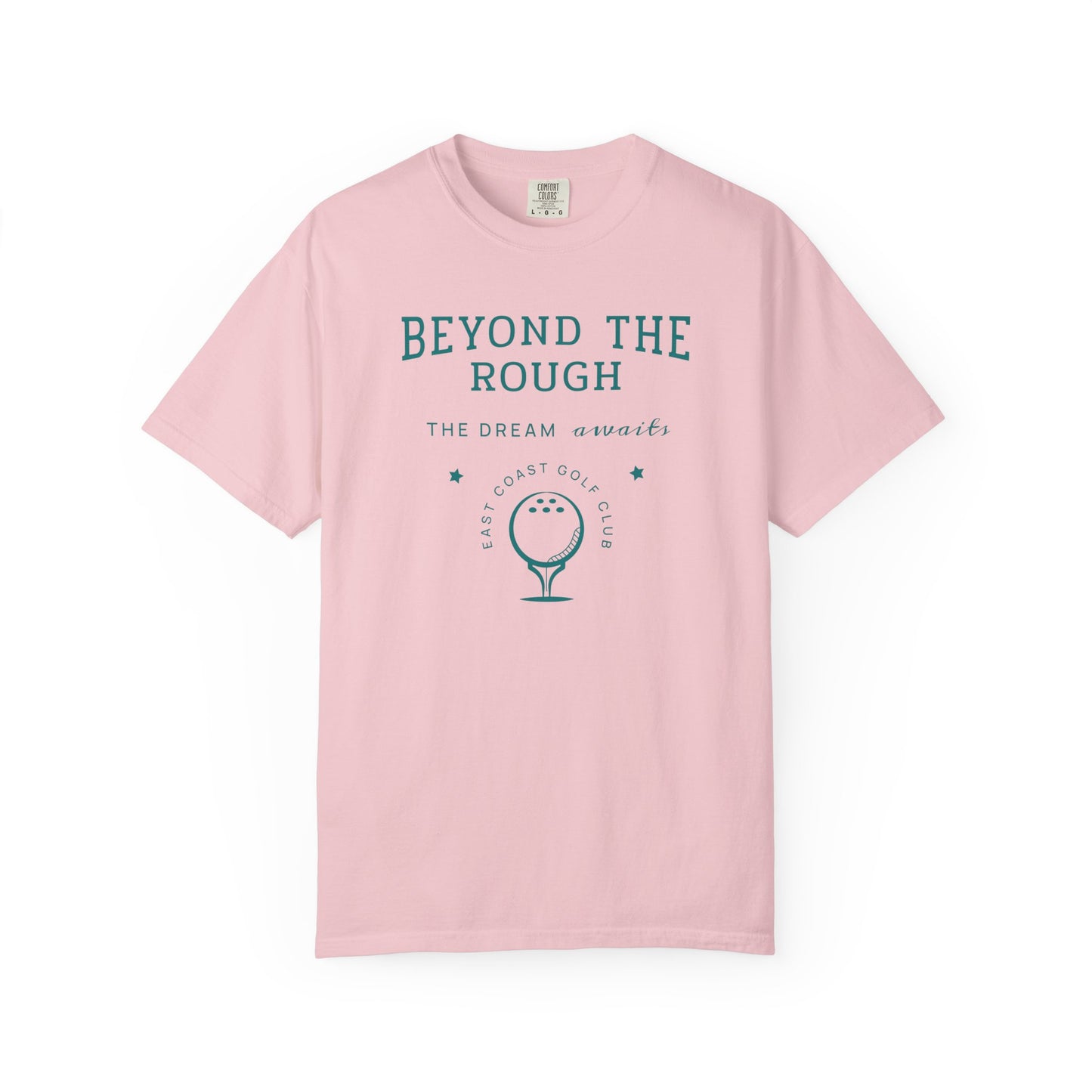 Pink t-shirt with 'Beyond the Rough' text and golf graphic on a white background