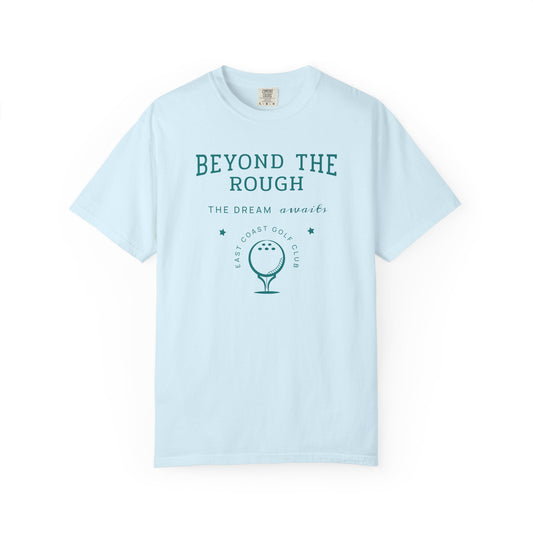 Light blue t-shirt with 'Beyond the Rough' text and golf graphic on a white background