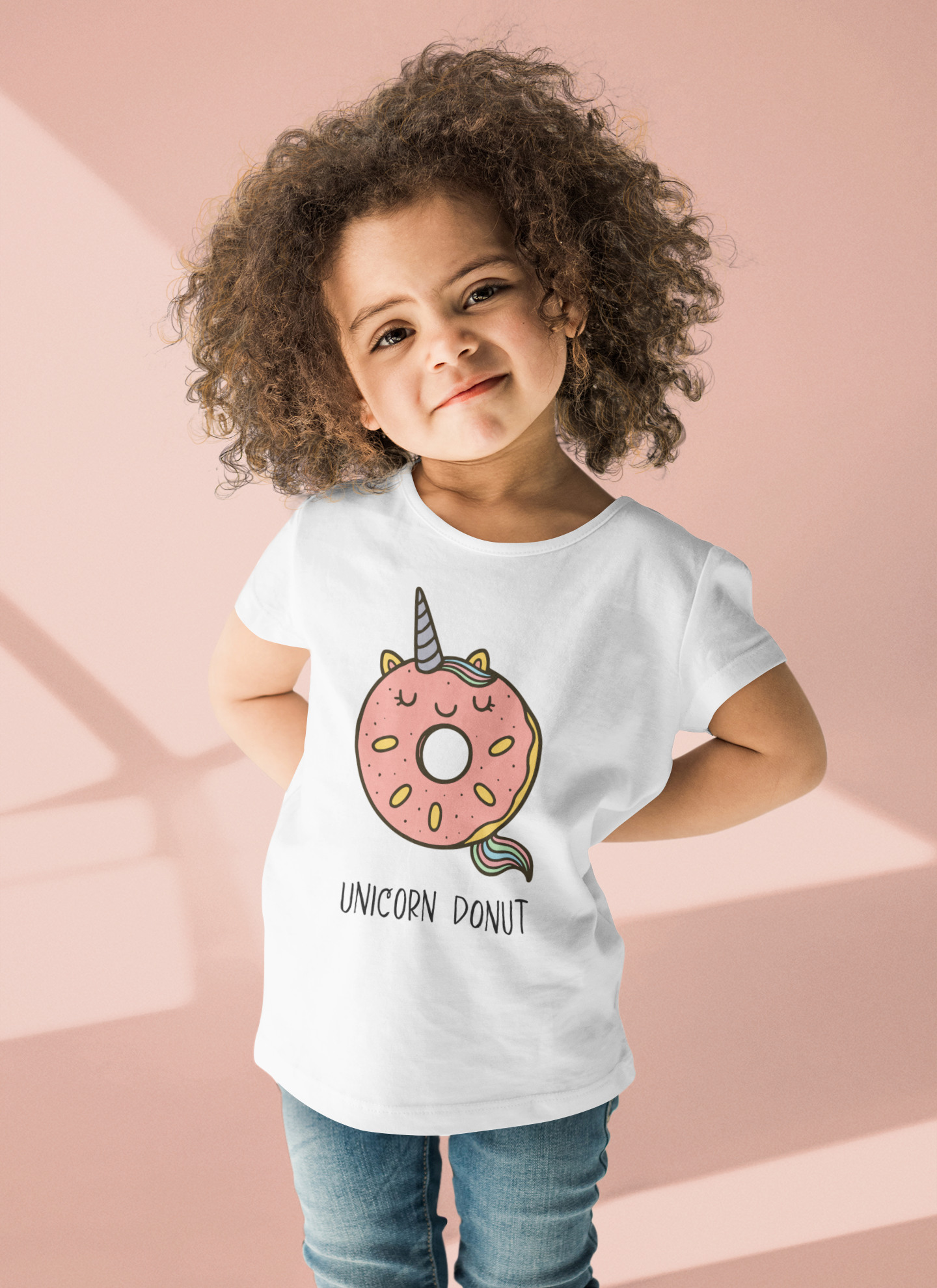 Adorable toddler in Unicorn Donut T-Shirt featuring magical unicorn donut graphic with rainbow sprinkles