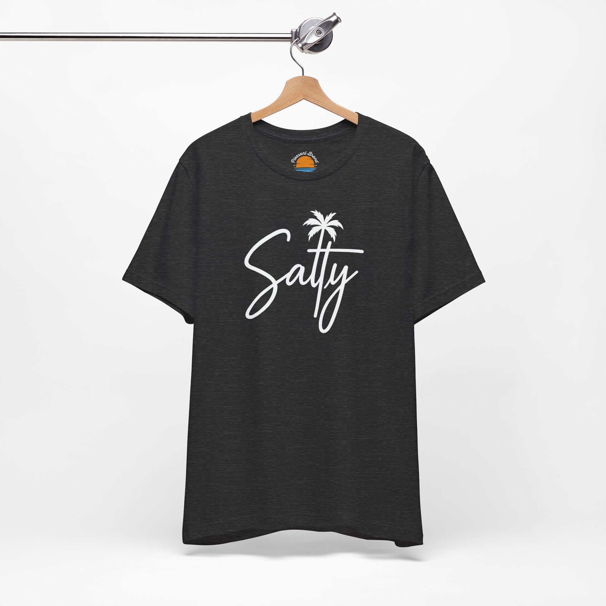Dark grey heather t-shirt with 'Salty' and a palm tree graphic on a hanger against a white background