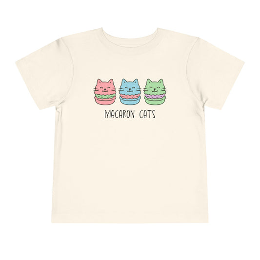 Beige t-shirt with 'Macaron Cats' design on a white background