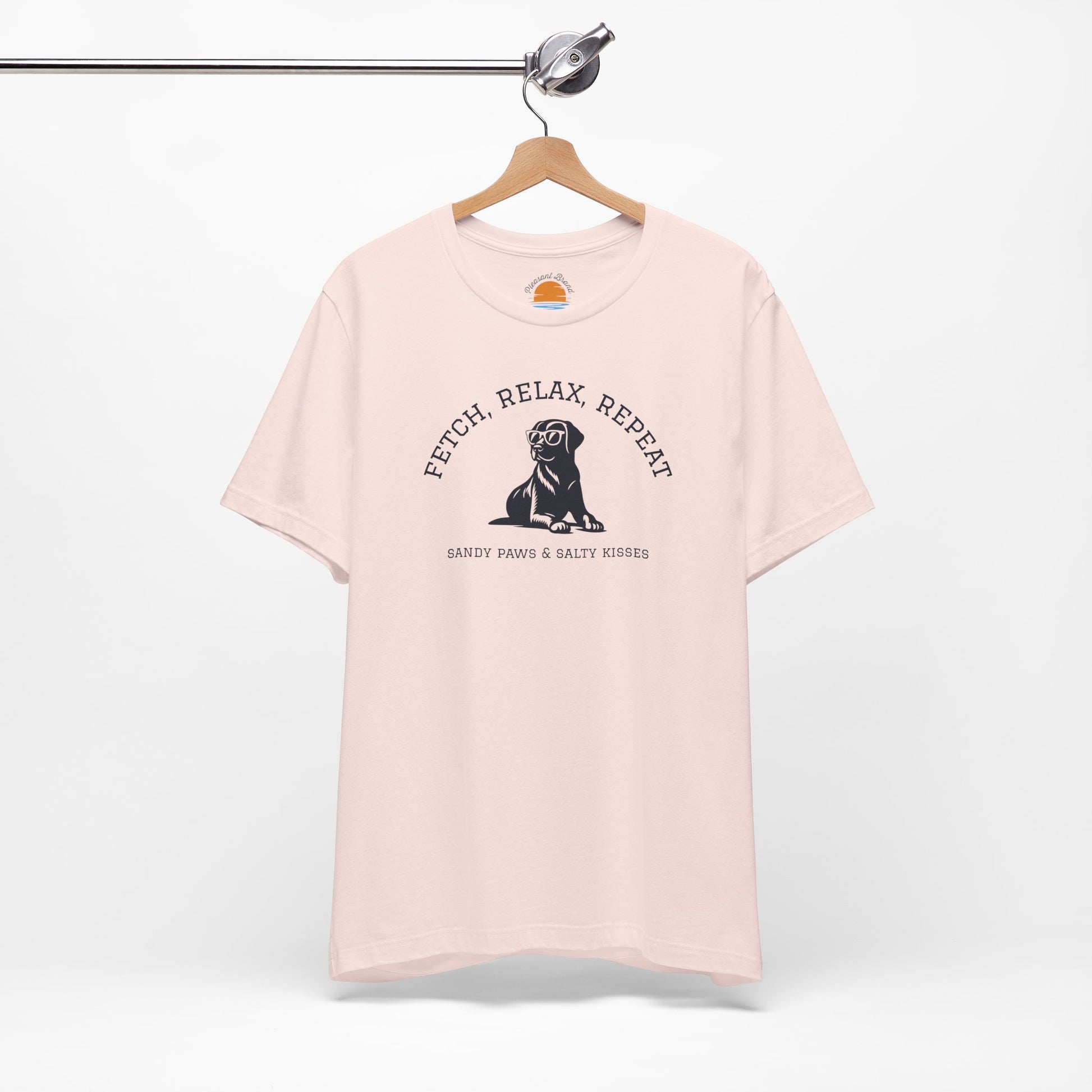 Pink Lab in Shades T-Shirt with a dog graphic and text Fetch, Relax, Repeat on a hanger against a white background