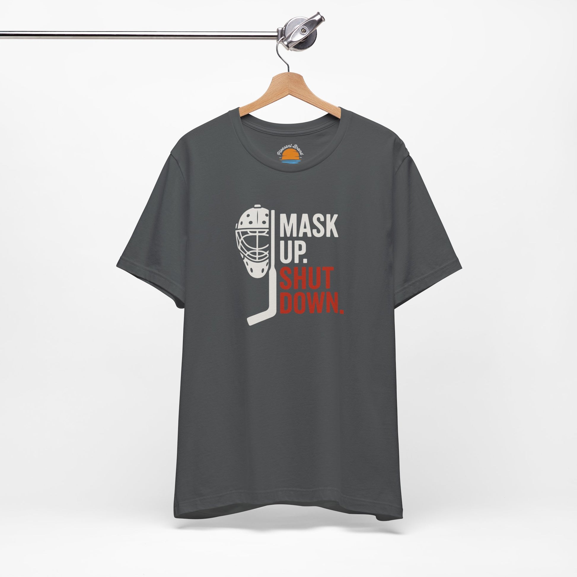 Asphalt t-shirt with Mask Up Shut Down text with goalie mask design on a white background