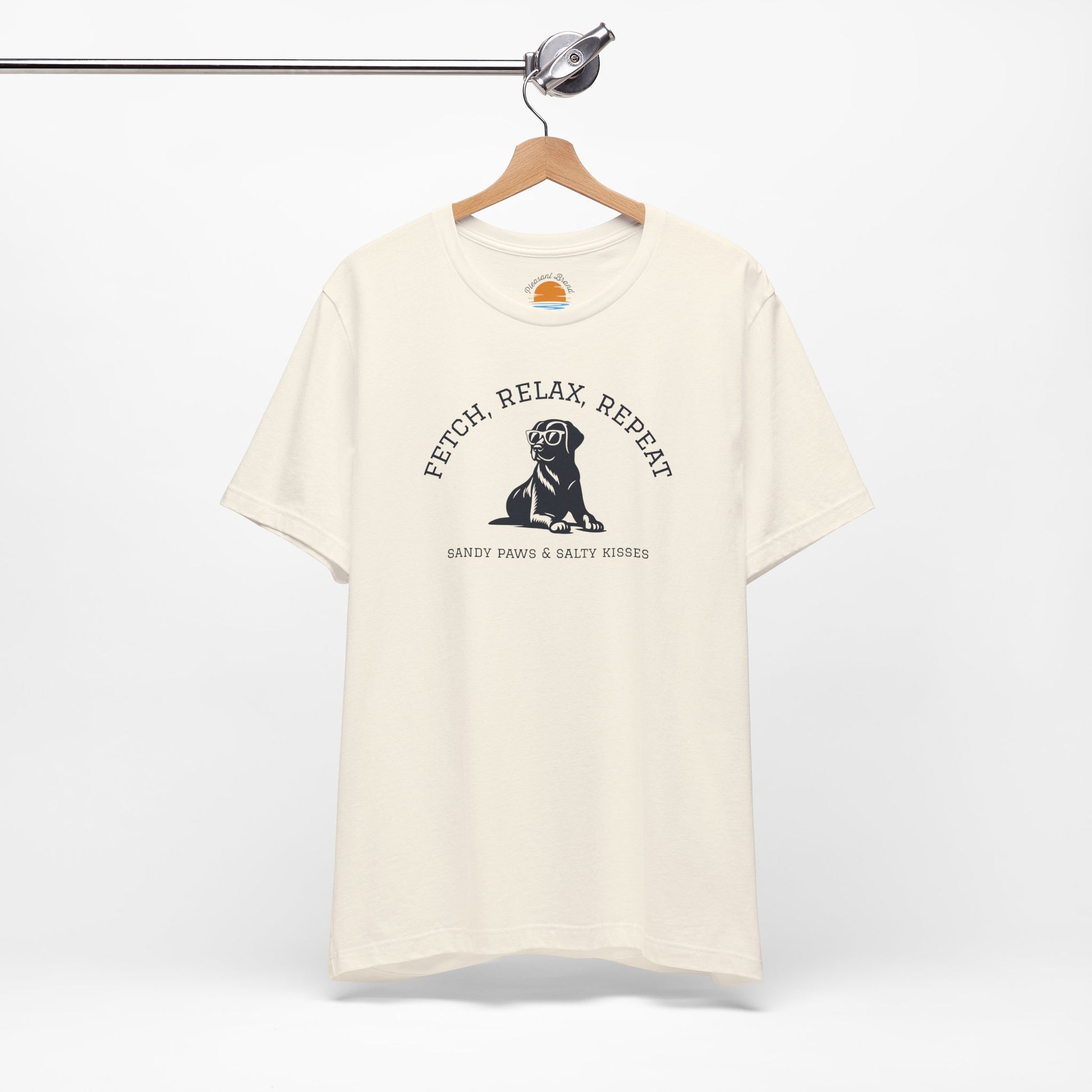 Beige Lab in Shades T-Shirt with a dog graphic and text Fetch, Relax, Repeat on a hanger against a white background