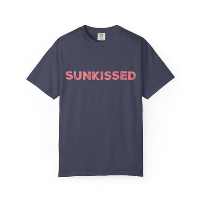 Denim color Comfort Colors T-shirt with 'Sunkissed'  text in pink on a white background