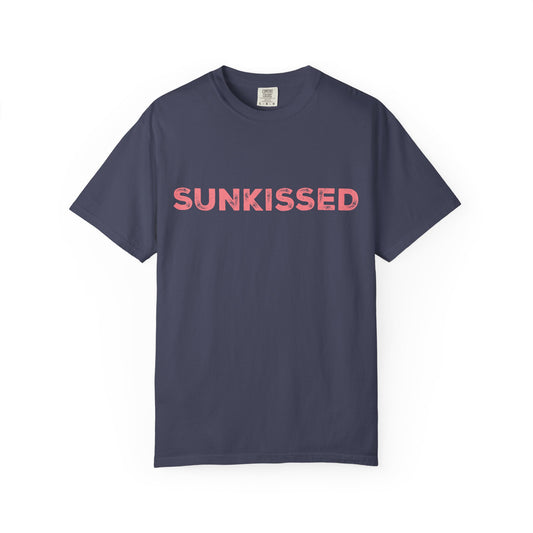 Denim color Comfort Colors T-shirt with 'Sunkissed'  text in pink on a white background