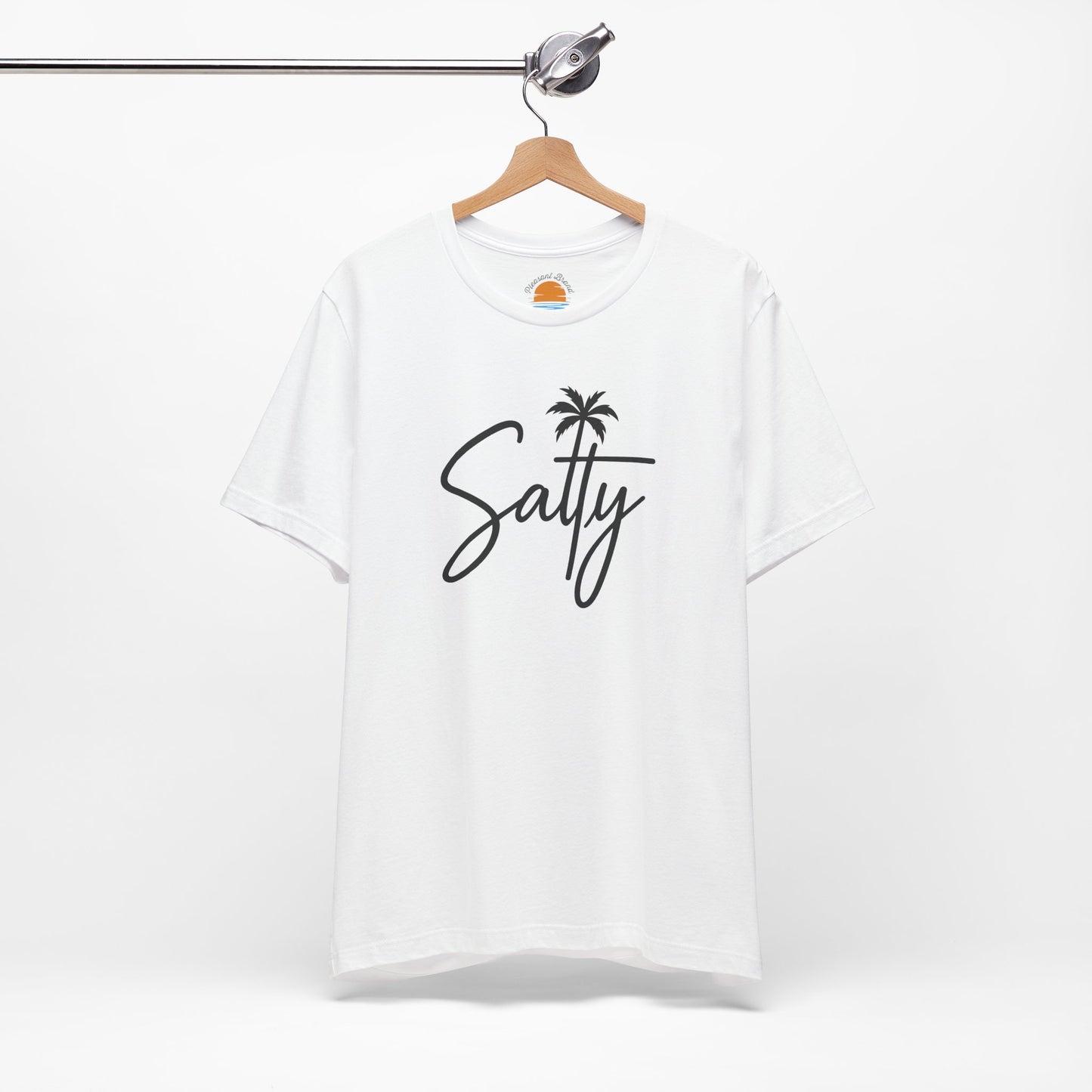 White t-shirt with 'Salty' and a palm tree design on a hanger against a white background