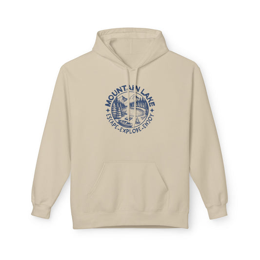 A light beige pullover hoodie with a dark blue circular 'Mountain Lake Escape Explore Enjoy' graphic printed on the chest, displayed on a clean white background.