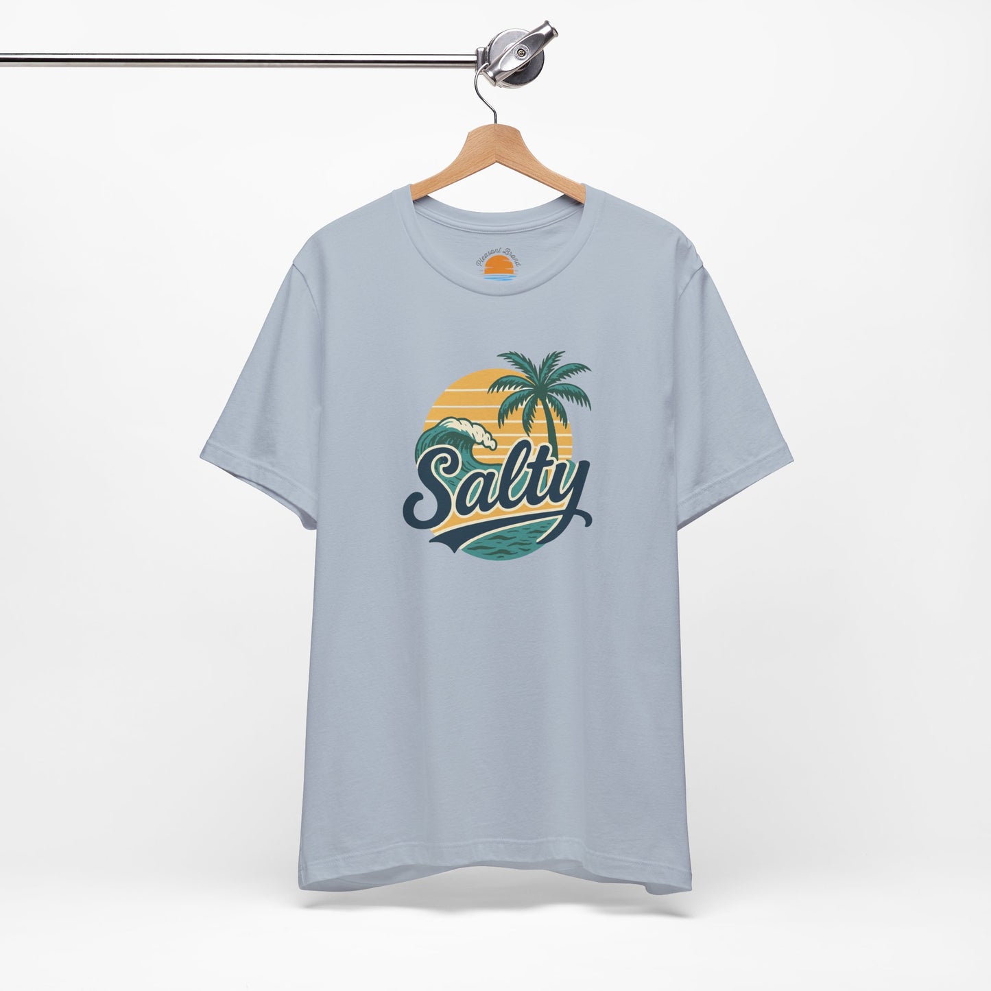 Light blue t-shirt with 'Salty' graphic on a hanger against a white background