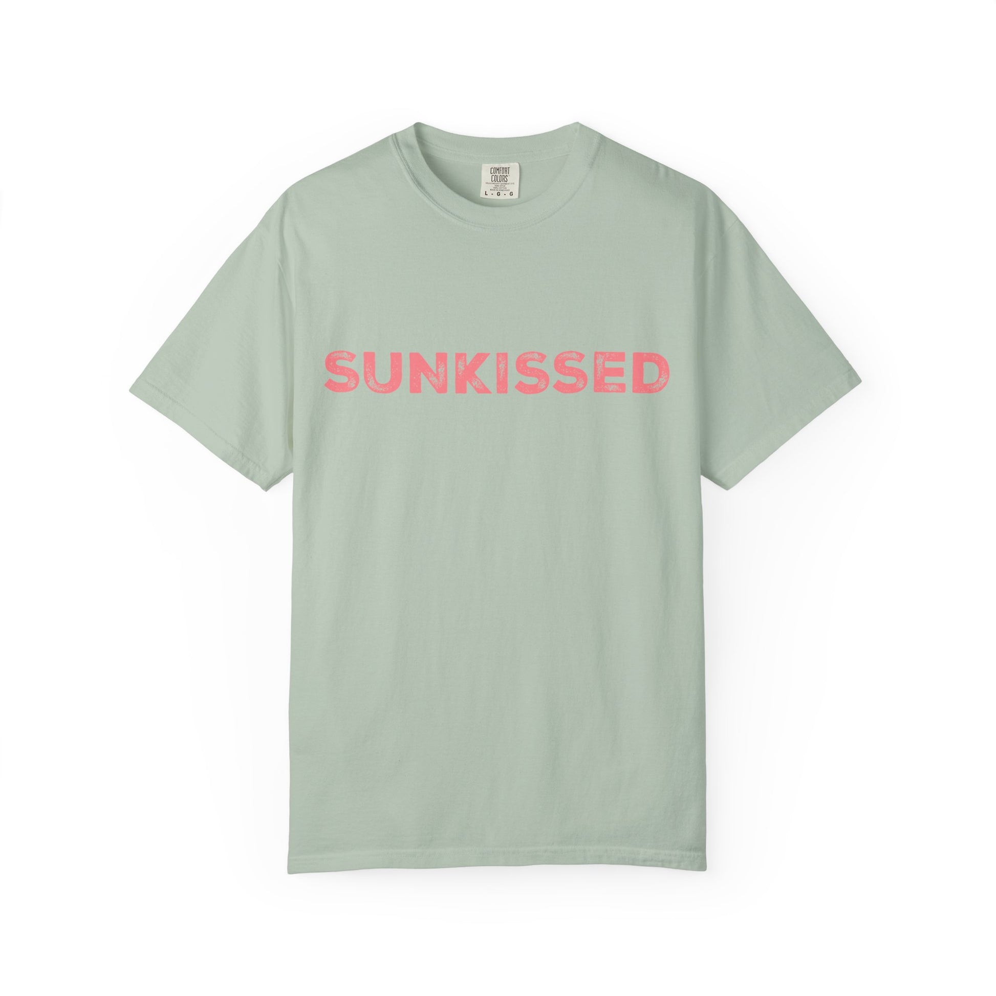 Bay color Comfort Colors T-shirt with 'Sunkissed'  text in pink on a white background