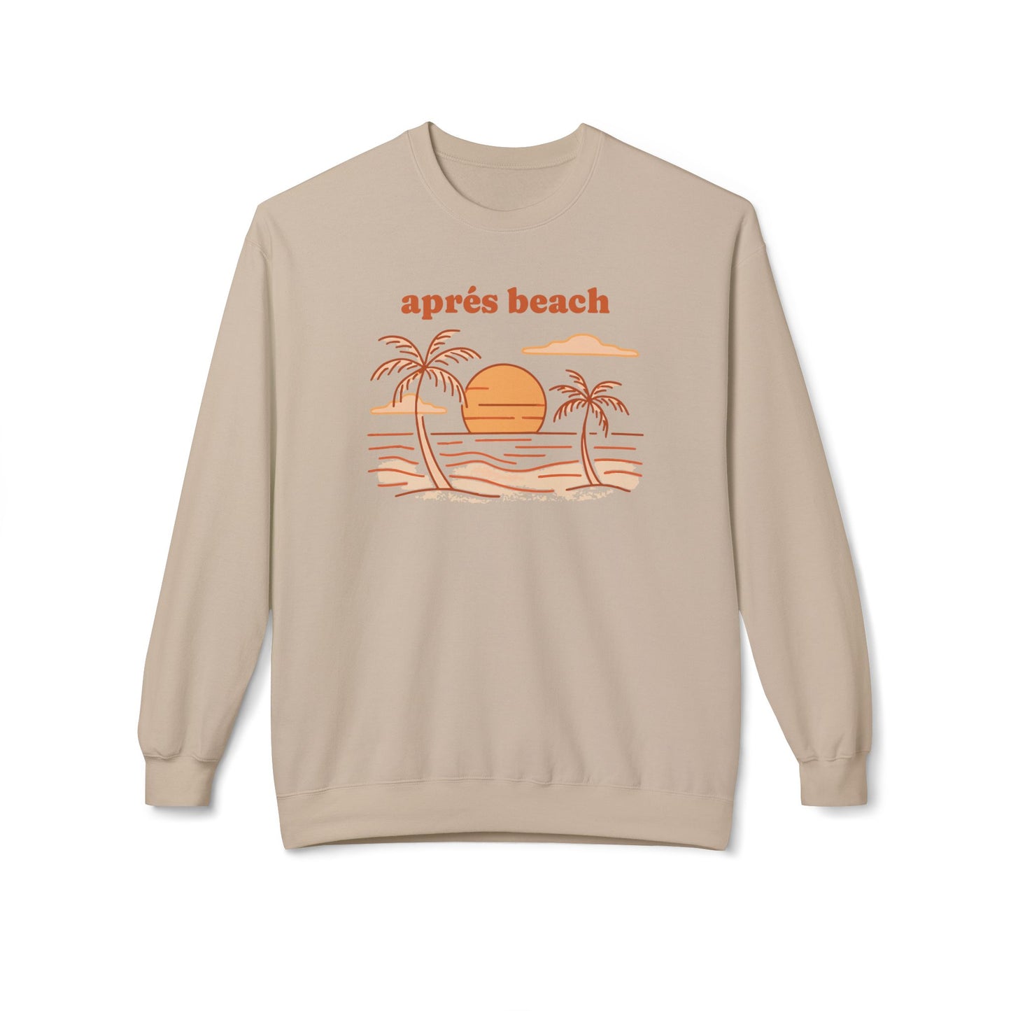 A beige crewneck sweatshirt featuring a retro-style graphic of a beach sunset with palm trees and the text 'après beach' in orange, displayed on a clean white background.