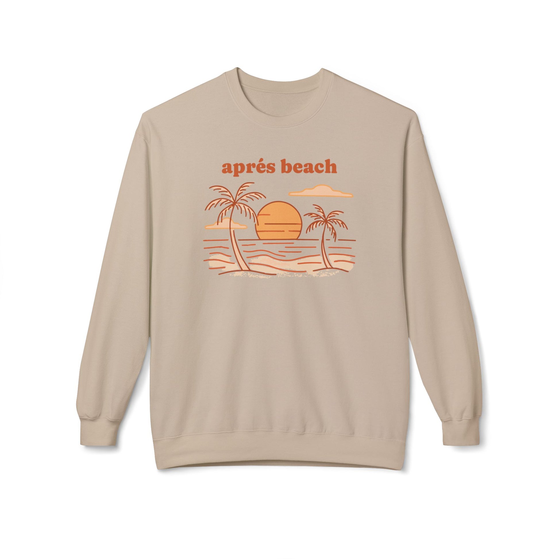 A beige crewneck sweatshirt featuring a retro-style graphic of a beach sunset with palm trees and the text 'après beach' in orange, displayed on a clean white background.