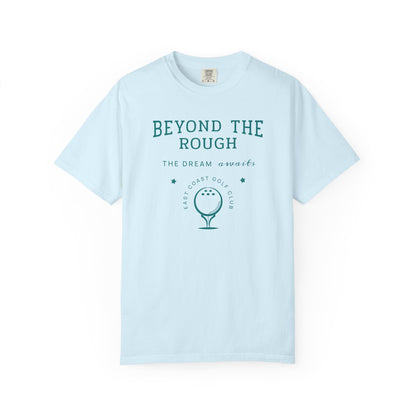 Light blue t-shirt with 'Beyond the Rough' text and golf graphic on a white background