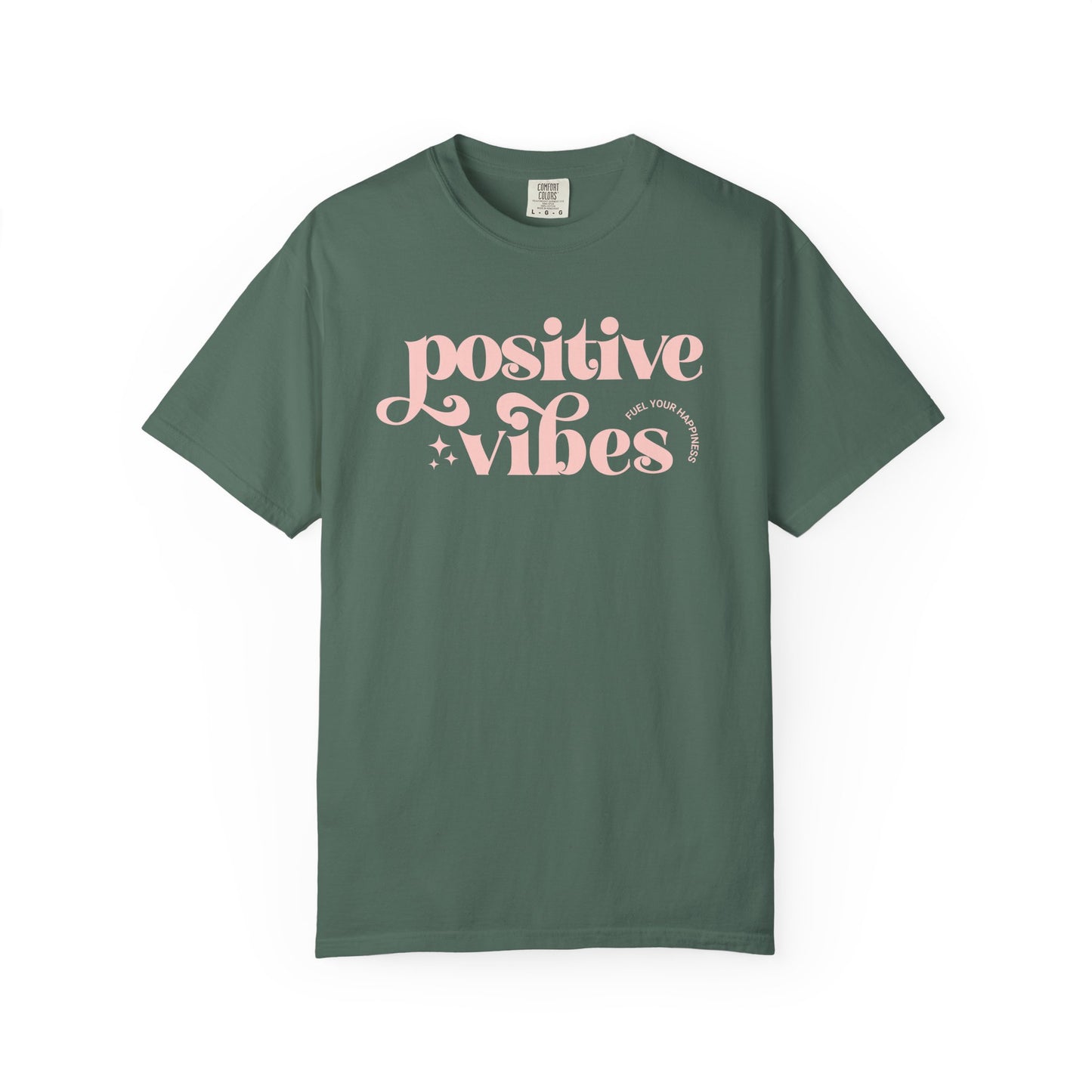 Green t-shirt with pink 'Positive Vibes' text on a white background