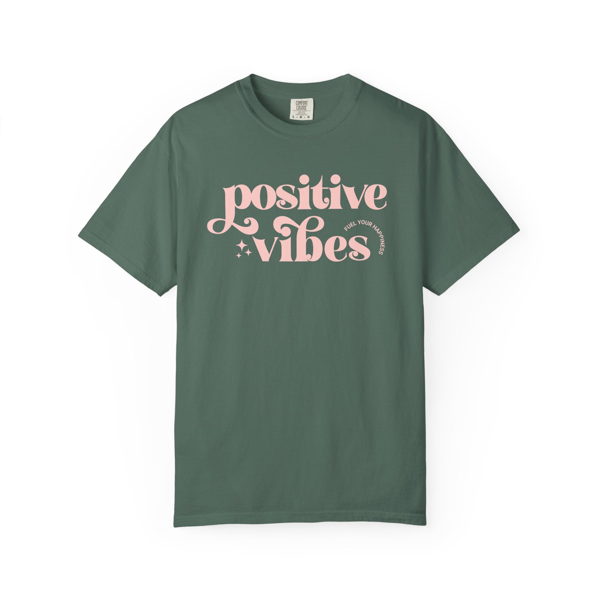 Green t-shirt with pink 'Positive Vibes' text on a white background