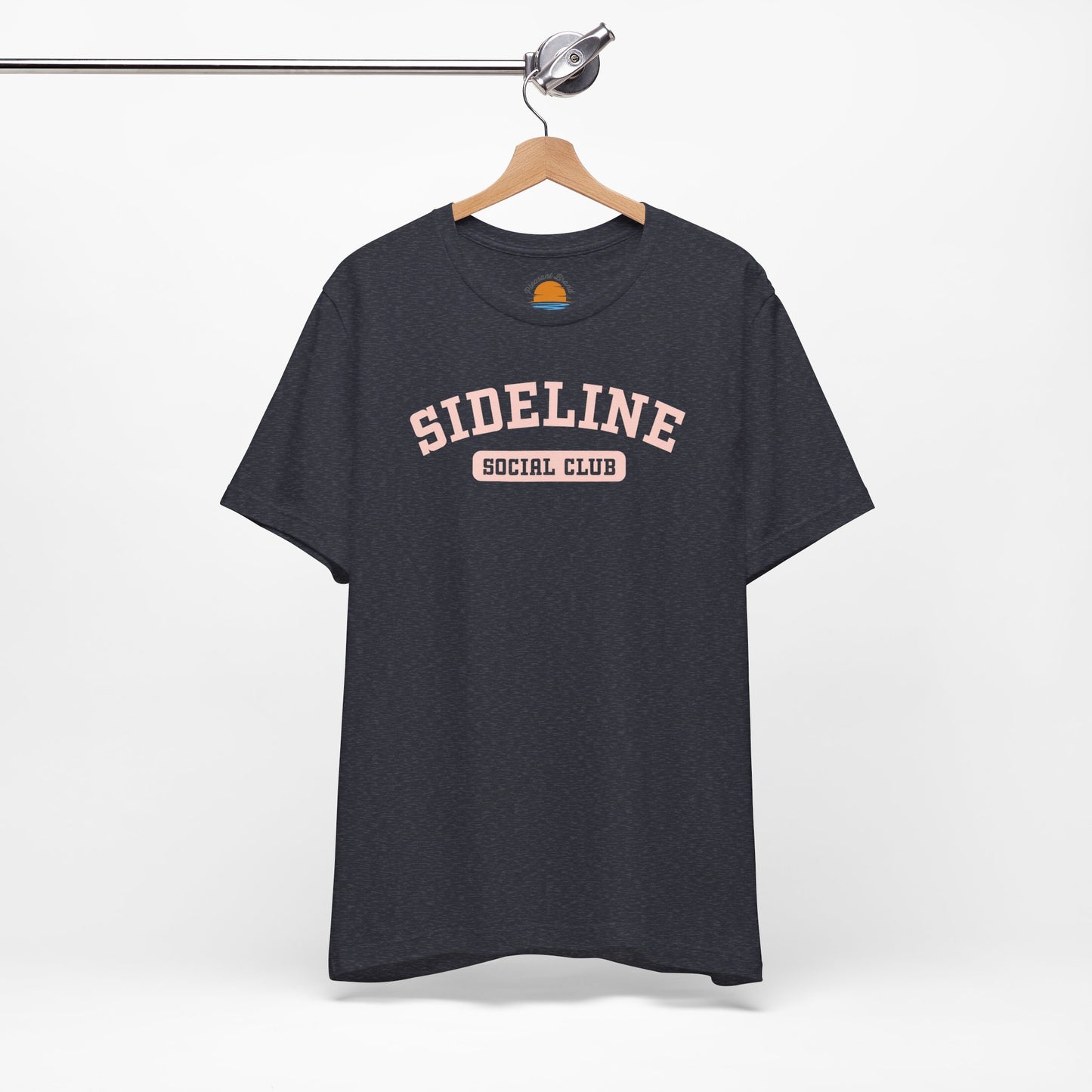 Heather navy t-shirt with 'Sideline Social Club' text on a hanger against a white background