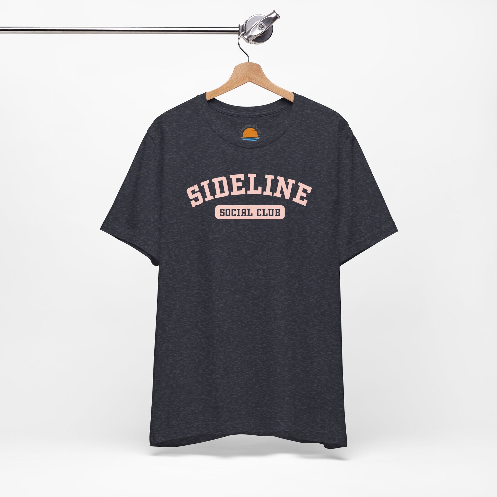 Heather navy t-shirt with 'Sideline Social Club' text on a hanger against a white background