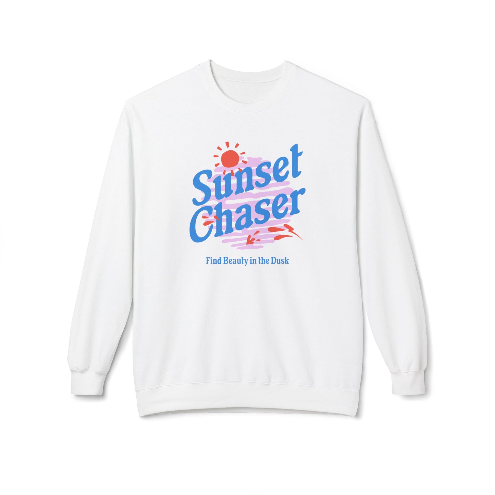 A white crewneck sweatshirt featuring a colorful retro-style graphic on the chest with the text 'Sunset Chaser' in blue and pink, a red sun, and the phrase 'Find Beauty in the Dark' in blue below it.