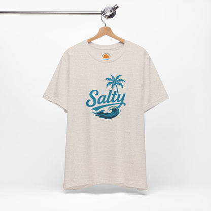 Heather dust t-shirt with 'Salty' blue wave and palm tree design on a hanger against a white background