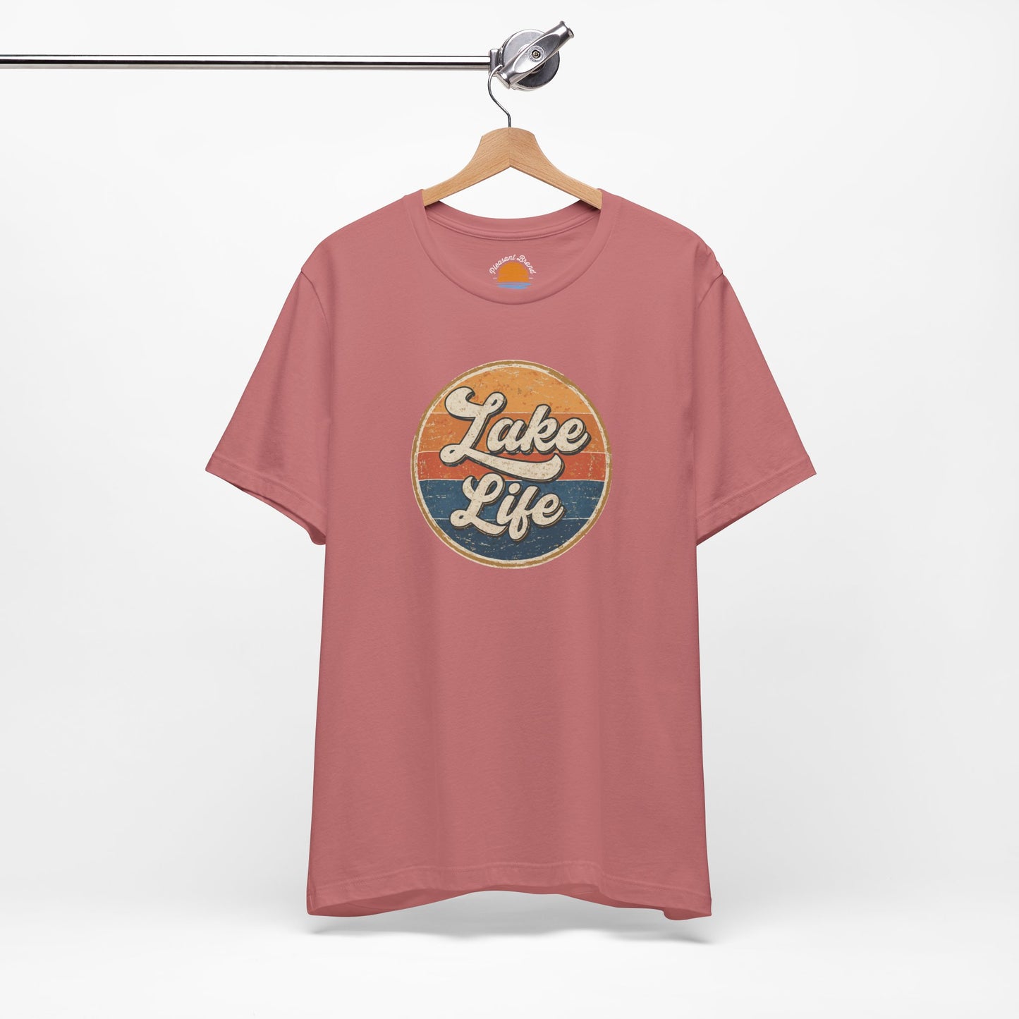 Mauve t-shirt with 'Lake Life' graphic on a hanger against a white background
