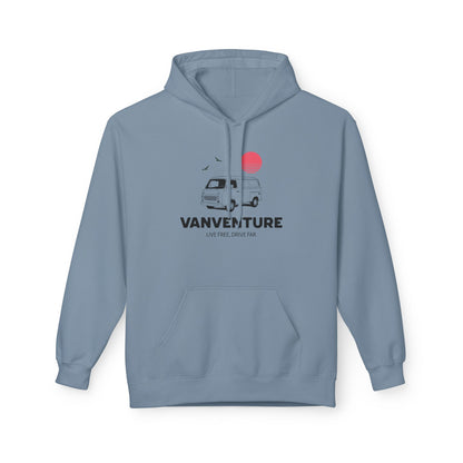 A light blue pullover hoodie with a front graphic of a retro van, a red sun, birds, and the text 'VANVENTURE' and 'LIVE FREE, DRIVE FAR'.
