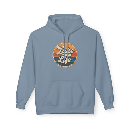 A light blue pullover hoodie with a circular retro-style graphic on the chest reading 'Lake Life' in white script over orange and dark blue horizontal stripes. The hoodie is shown against a plain white background.