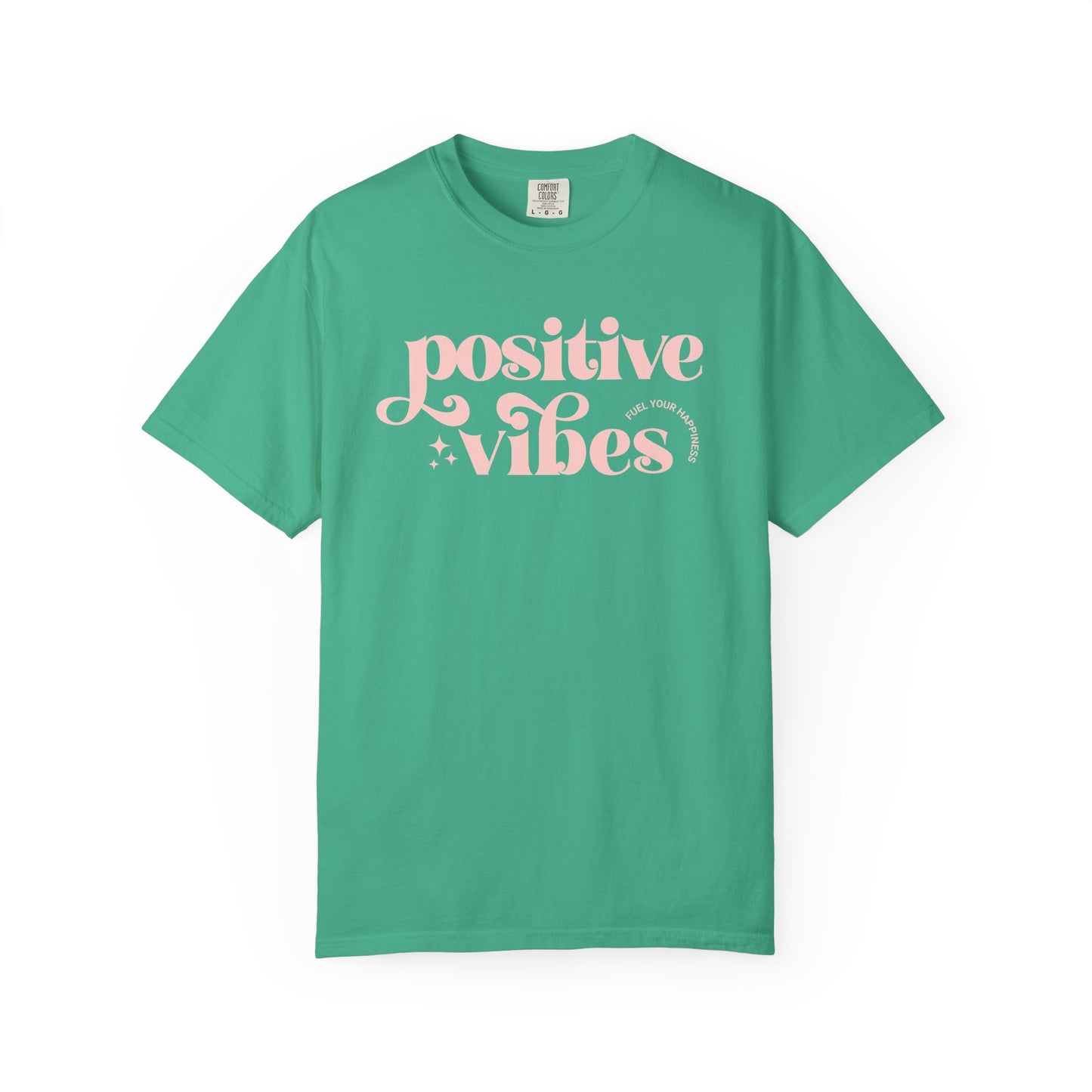 Kelly green t-shirt with pink 'Positive Vibes' text on a white background