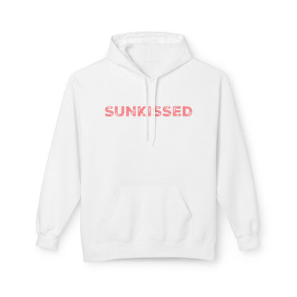 A white pullover hoodie with the word 'SUNKISSED' printed across the chest in a pink gradient, shown against a plain white background.