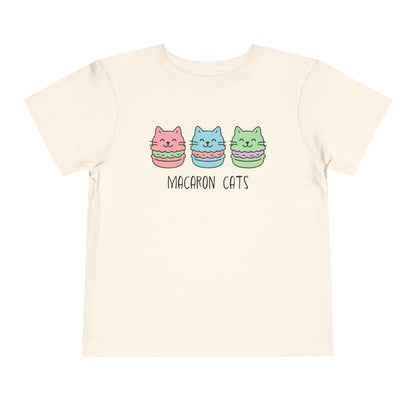 Beige t-shirt with 'Macaron Cats' design on a white background