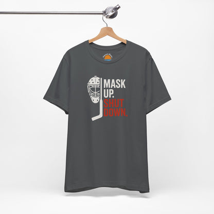 Asphalt t-shirt with Mask Up Shut Down text with goalie mask design on a white background